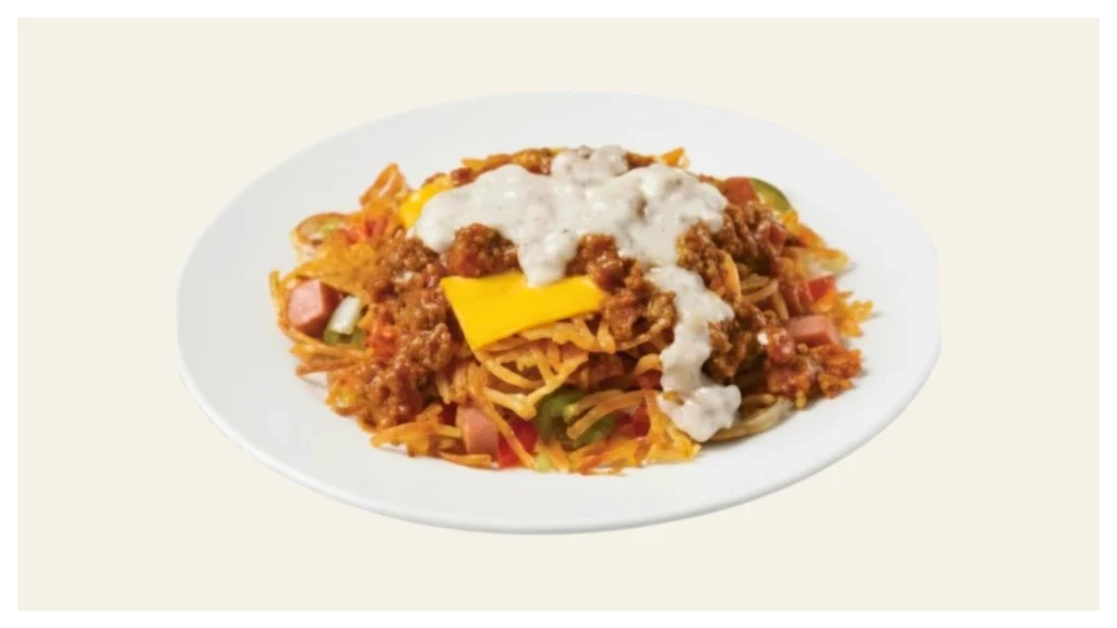 Waffle House Loaded Hashbrowns “All The Way” with ham, cheese, jalapeños, mushrooms, tomatoes, and onions.